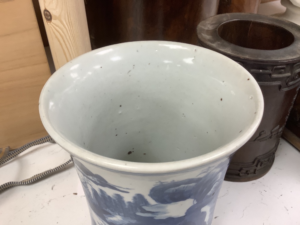 A Chinese blue and white porcelain brush pot, painted with a landscape, 17cm high, in later pine box
